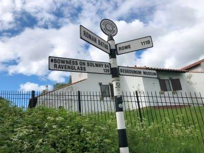 5 end signpost |  Jane Logan