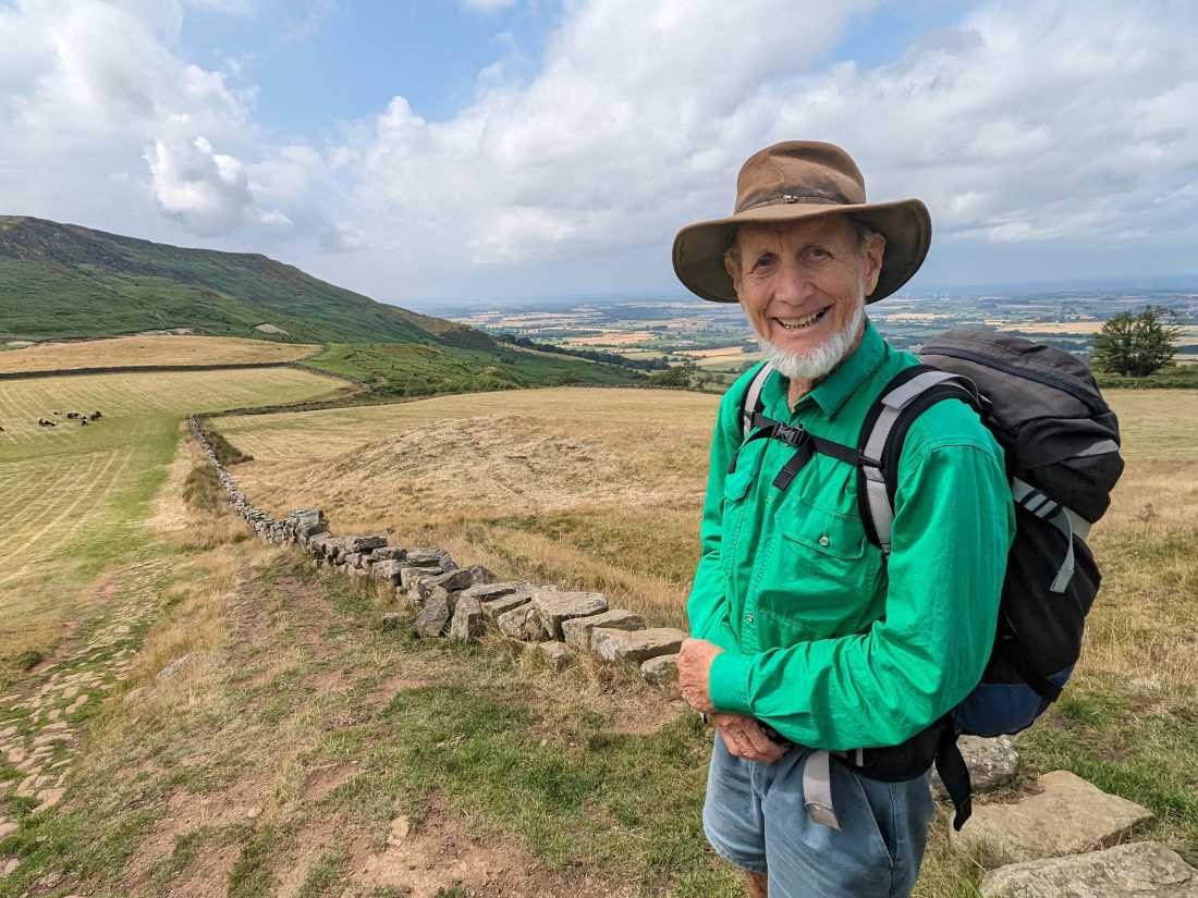 Happy Coast to Coast Hiker on the Moors |  Jon Millen